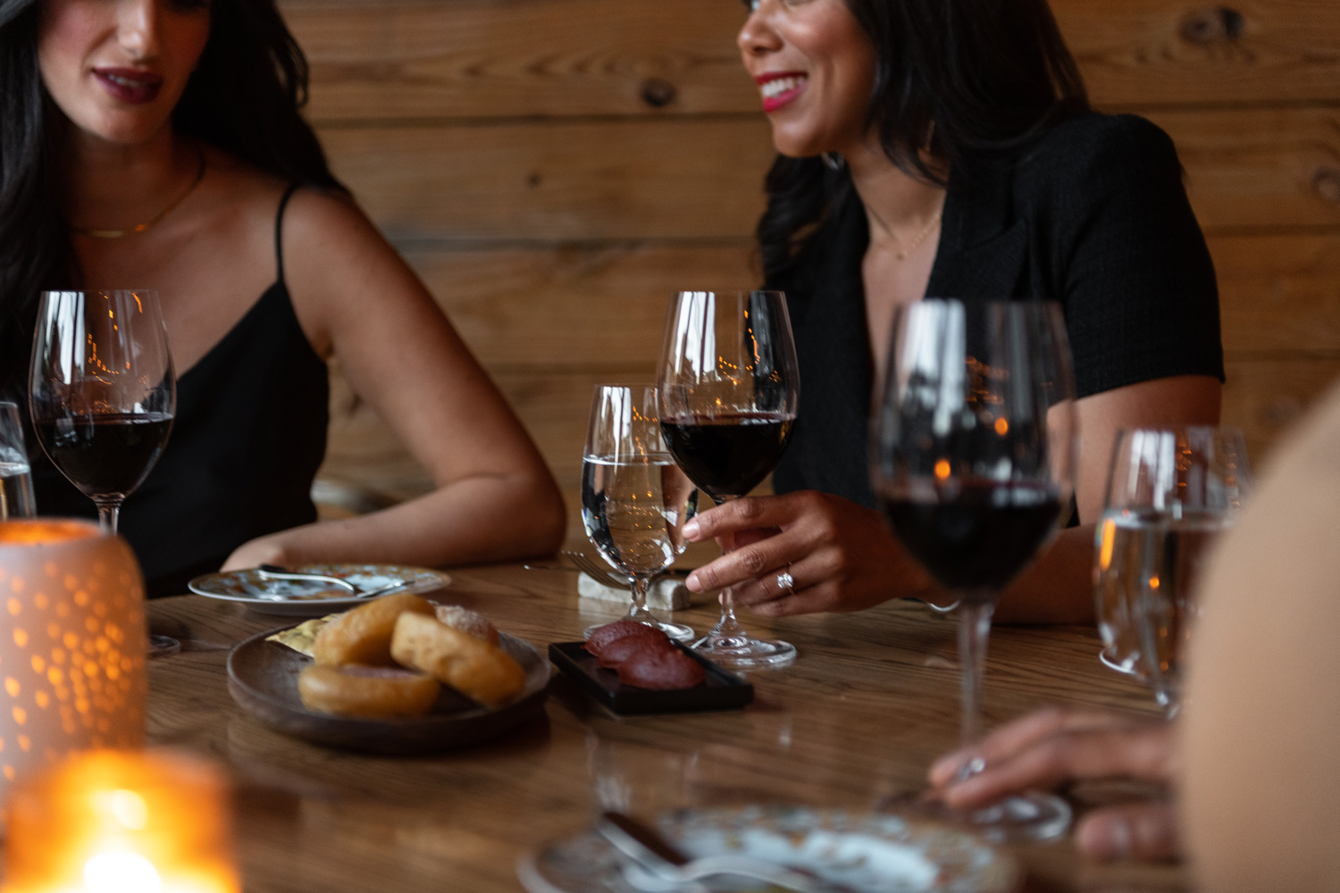 Friends enjoying happy hour together at a near by restaurant