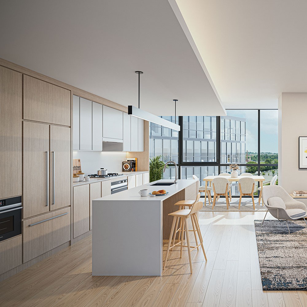 A glamorous apartment with light oak-colored cabinets and floors